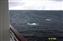 Small icebergs appear as the ship gets closer