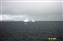 Larger icebergs appeared as the ship retreated from the channel
