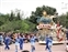 Disney on Parade logo float with dancers