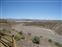 View from parking to desert valley below town.